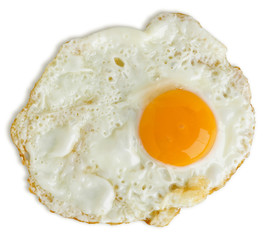Greasy fried egg on white background