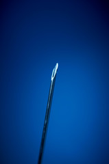 Detail of a blue sterilized needle. Selective depth of focus