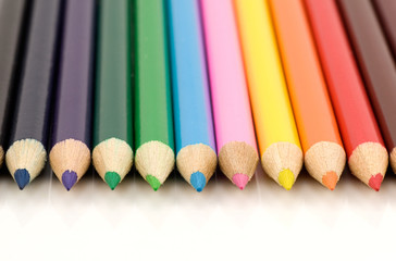 set of colored pencils  on white background