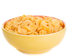 corn flakes in plate isolated on white background