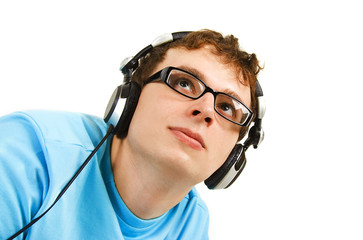 portrait of man in blue shirt with headphones isolated on white