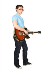 young man in glasses and blue shirt playing guitar isolated on w