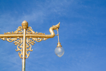 Fototapeta na wymiar Thai vintage lamp with blue sky