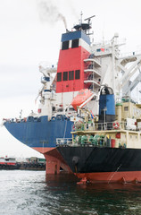 Two ships moored at port