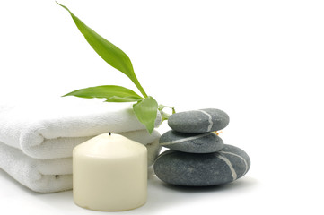 Time to relax – stacked stones ,towel and candle