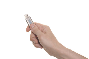 well shaped hand with an USB flash isolated over white