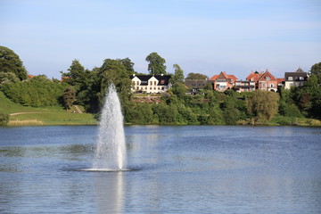 lake and fountain of royal Frederiksborg Castle in Denmark