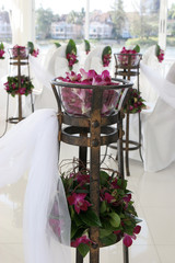 white wedding chapel decorated with beautiful flowers.