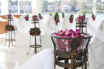 White wedding chapel decorated with beautiful flowers.
