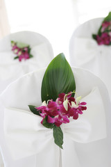 White wedding chapel decorated with beautiful flowers.
