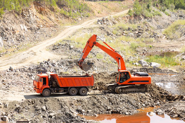 Dump Truck and Excavator in a Quarry