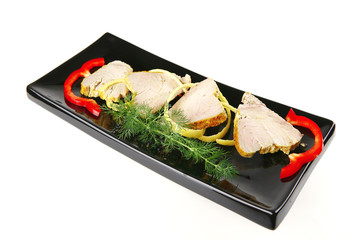 light tuna slices served on plate