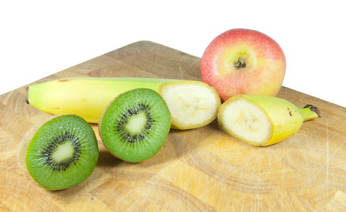 fruit on chopping board isolated on white background