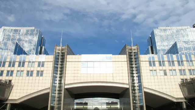 Time lapse clouds over European Parliament, Brussels