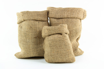 Burlap sacks over white.