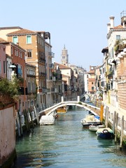 Fototapeta na wymiar A Small Canal in Venice Italy