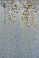 gray blue rusty metal plate with leaks