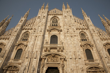 Fototapeta premium Looking up at the Duomo Cathedral Church in Milan, Italy