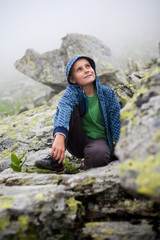 Cute kid outdoor in mountains