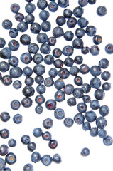 Bilberries on the wite surface
