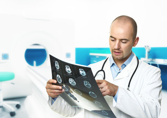 young doctor check tomography result