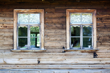 Old wooden wall with windows