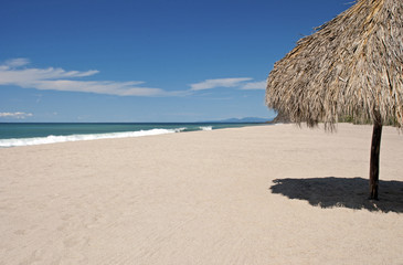 Ocean, beach, sand and palapa