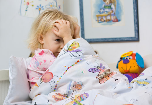 little girl in bed