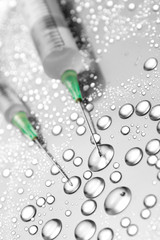 Two medical syringes