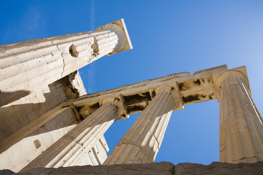 Columns of propylaea in Acropolis Athens Greece on blue sky back
