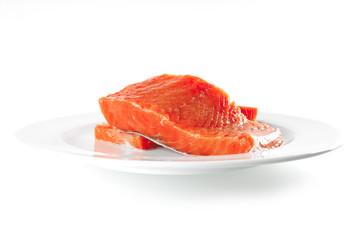 fresh smoked salmon on white plate