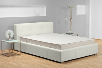 A view of a modern bed in a bedroom