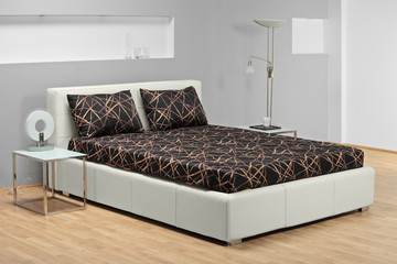 A view of a modern bed in a bedroom