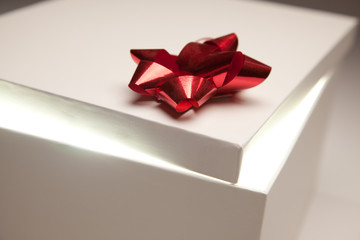 Red Bow Gift Box Lid Showing Very Bright Contents