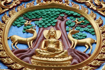Fototapeta na wymiar art on gable of temple, Wat Kwan Muang, Borabue, Mahasarakam