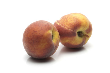 two ripe peaches
