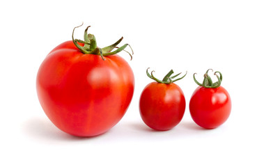 Three tomatoes on a white background