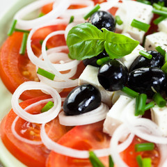 Tomato salad with feta cheese and olives