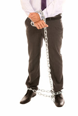 Businessman hands and legs fettered with chain, job slave