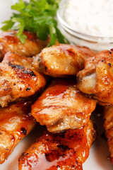 Chicken wings with sauce