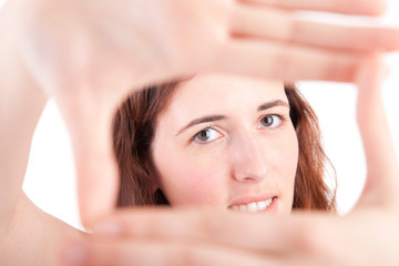Obraz premium Woman showing framing hand gesture