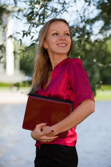 Young businesswoman with laptop.