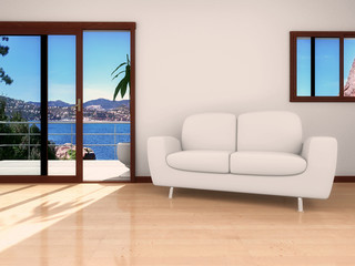 int&eacute;rieur d'appartement plus canap&eacute; blanc vue mer