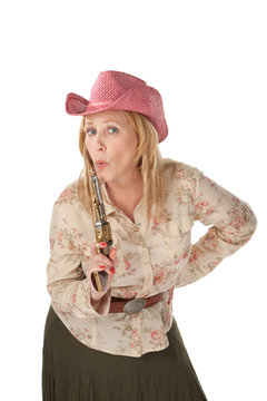 Cowgirl on with a recently used pistol