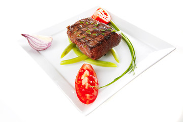beef fillet served on white