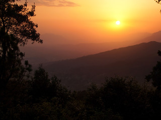 Fototapeta na wymiar Sunset over the hills