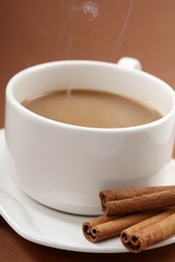 cup of coffee with cinnamon