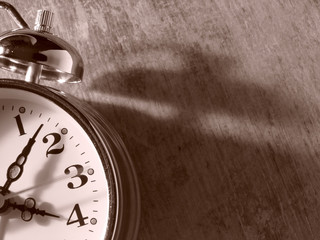 sepia toned alarm clock fragment