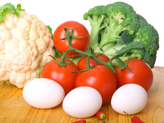 Fresh and bright vegetables on white background