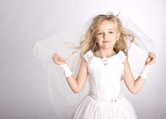 little girl in a dress of the bride